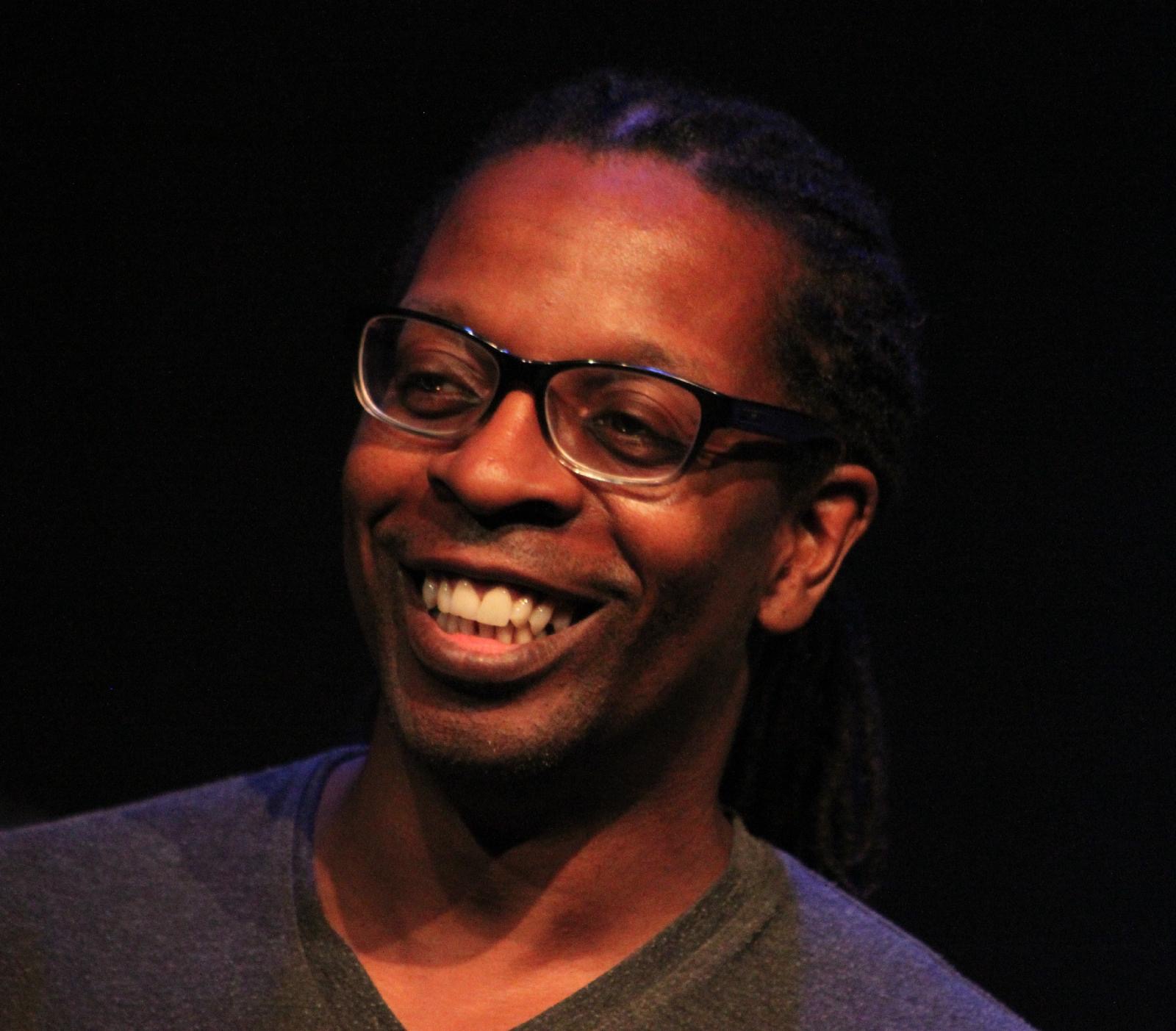 Michael Henry in glasses, smiling