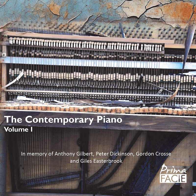 Photo of the inside of a damaged upright piano