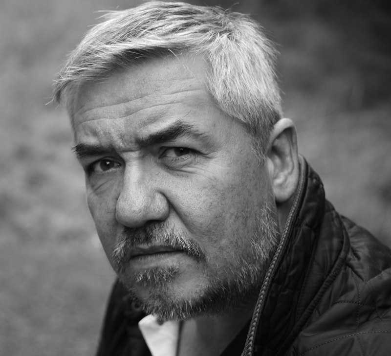 head and shoulders of Steve Plews with beard and moustache looking at the camera